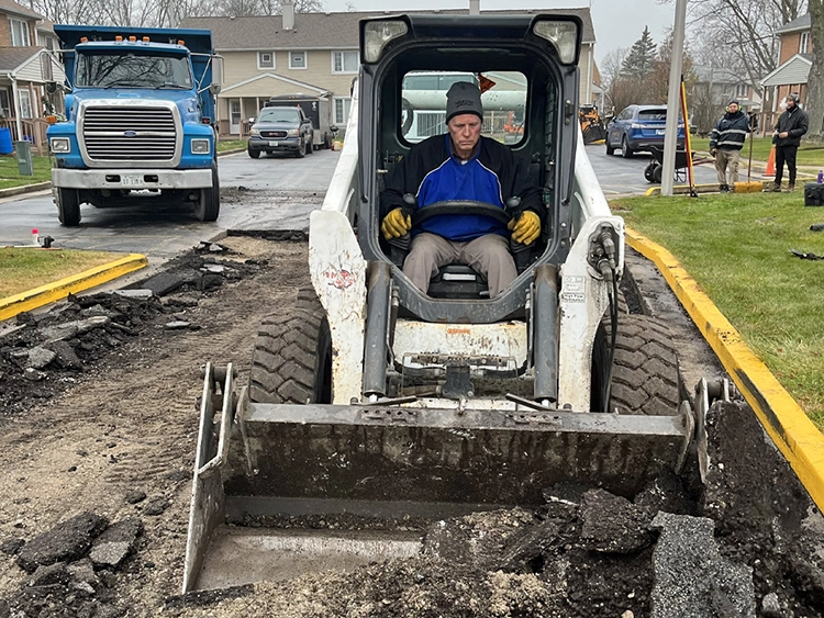 John Zarlengo Asphalt Paving crew excavating parking lot
