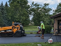 Residential driveway asphalt paving by John Zarlengo Asphalt Paving