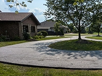 Residential driveway asphalt paving by John Zarlengo Asphalt Paving